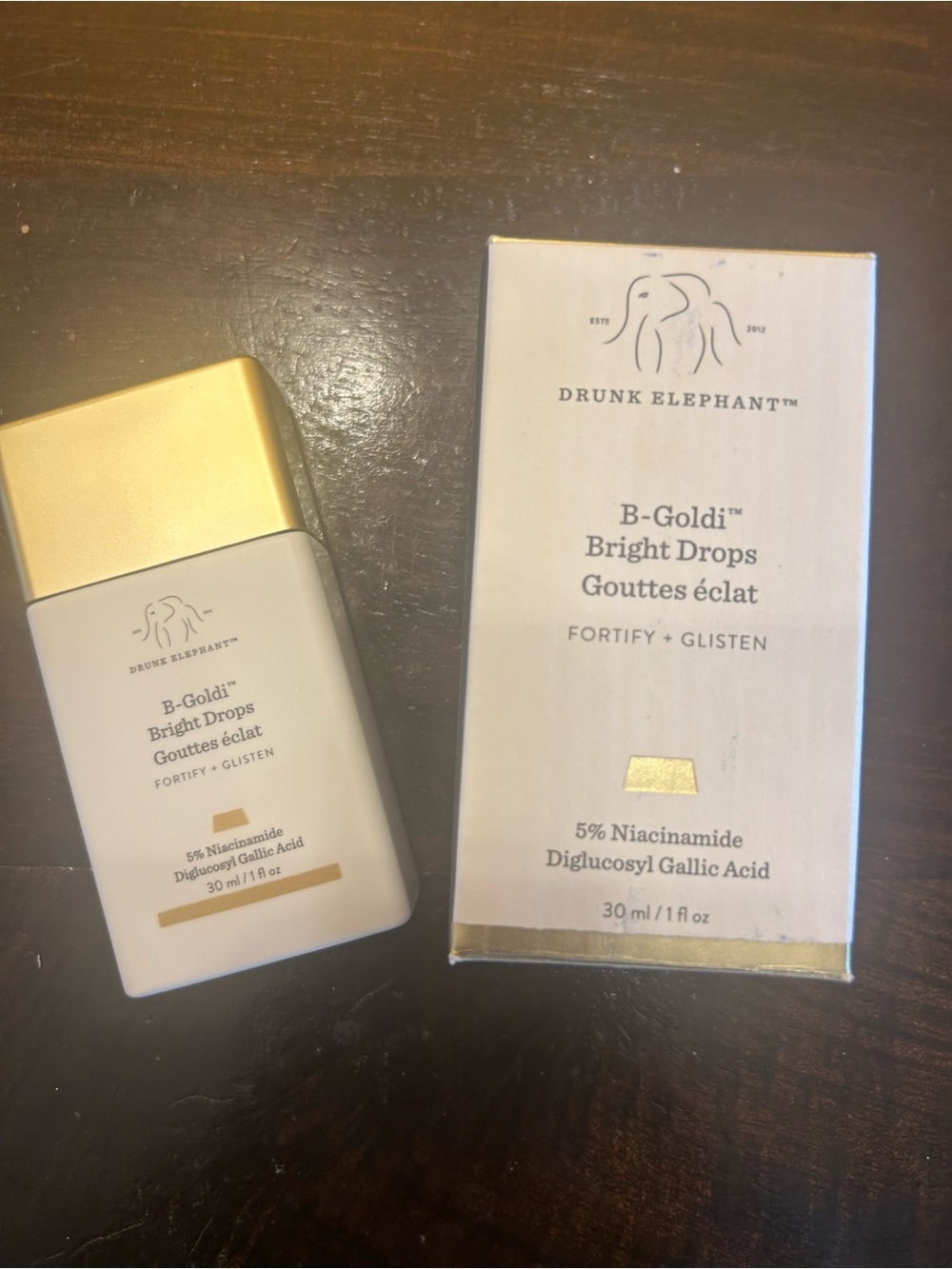 Drunk Elephant B-Goldi Bright Drops - White and Gold Bottle & Box